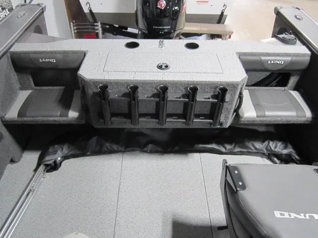 Slide: The Image of 2025 Lund 1875 Fisherman Sport boat interior with rod holders and seating. - 8