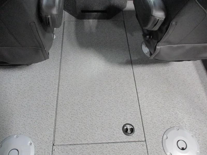 Slide: The Image of 2025 Lund Fisherman 1875 boat interior with gray carpet and seating. - 7