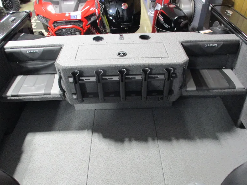 Slide: The Image of 2025 Lund Fisherman 1875 boat interior with rod holders and seating. - 8