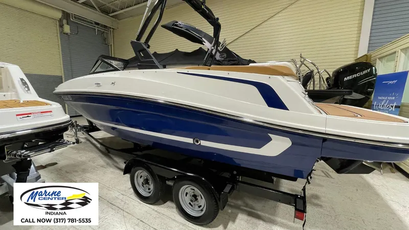 Slide: The Image of 2019 Bayliner VR 5 boat on trailer at Marine Center Indiana showroom. - 1