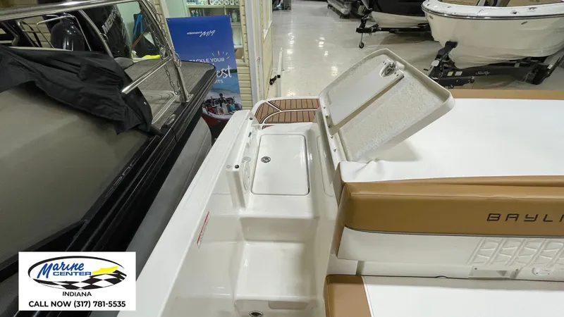 Slide: The Image of 2019 Bayliner VR 5 boat interior at Marine Center, Indiana showroom. - 11
