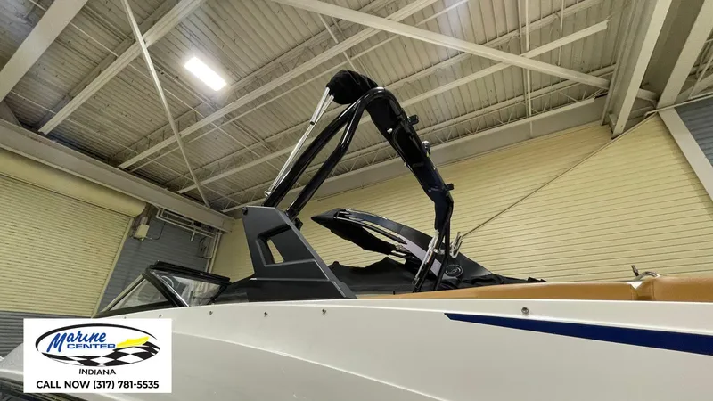 Slide: The Image of 2019 Bayliner VR 5 boat displayed indoors at Marine Center Indiana. - 13