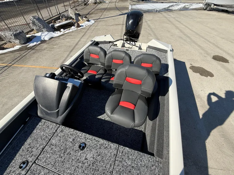 Slide: The Image of 2025 Tracker Pro Team 175 boat with modern seating and steering console. - 9
