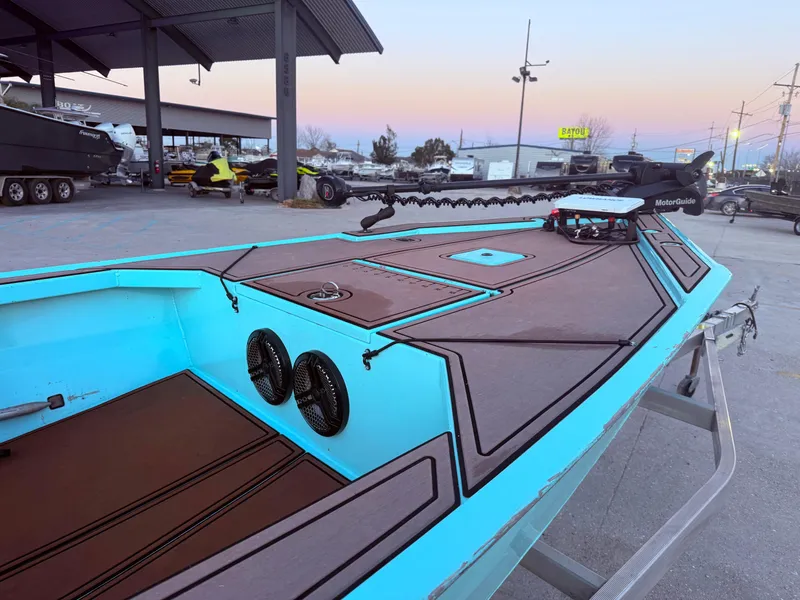 Slide: The Image of Custom Uncle J 19 Bay Center Console Aluminum boat, 2022 model, with sleek design and modern features. - 9