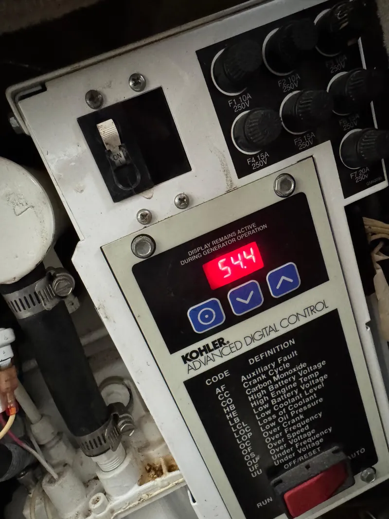 Slide: The Image of Kohler digital control panel on 2007 Sea Ray 280 Sundancer boat. - 14