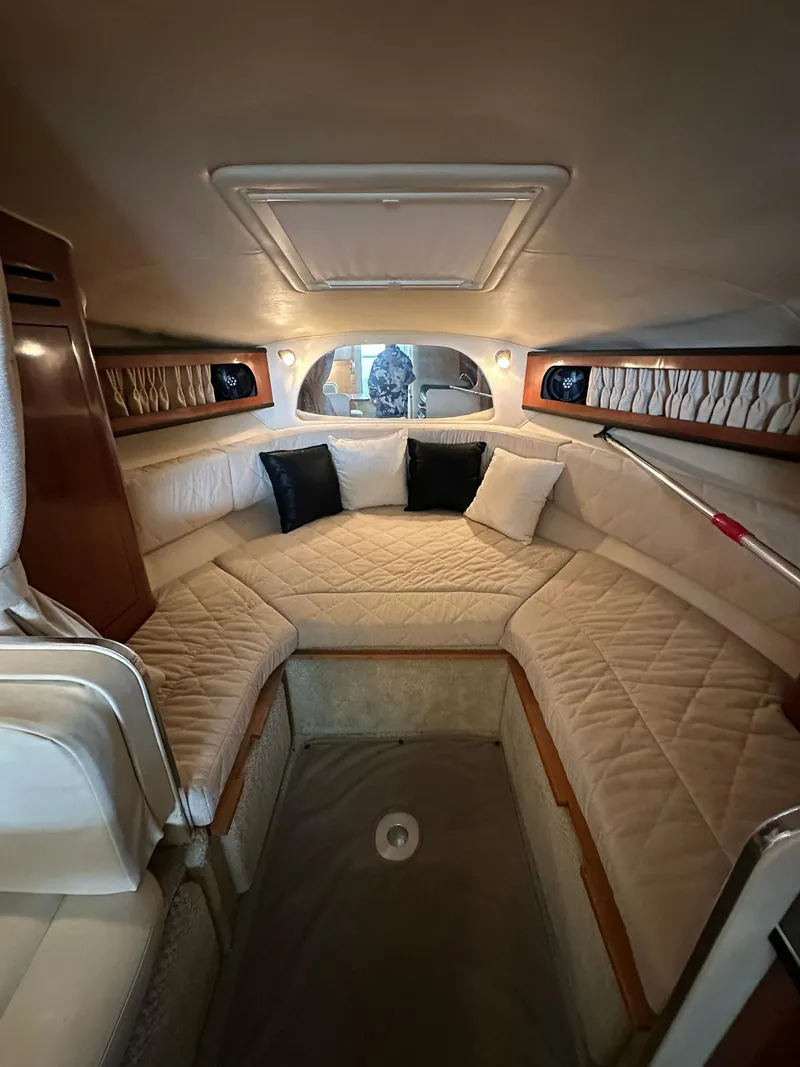 Slide: The Image of Luxurious interior of 2007 Sea Ray 280 Sundancer with plush seating and elegant design. - 9