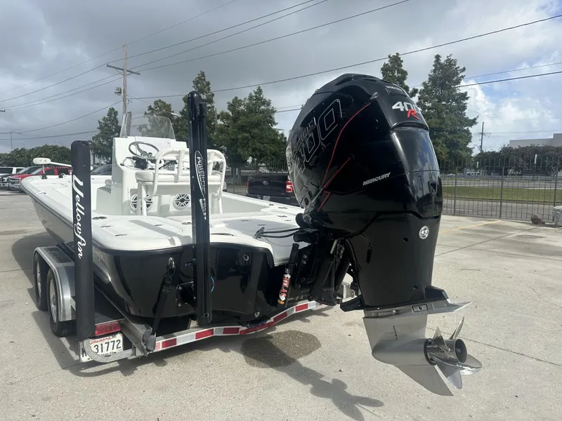 Slide: The Image of 2012 Yellowfin 24 Bay boat with Mercury 400R engine on trailer. - 17