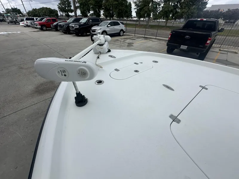 Slide: The Image of 2012 Yellowfin 24 Bay boat with Minn Kota trolling motor in parking lot. - 9