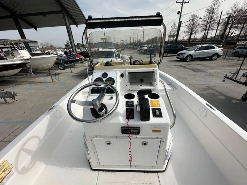 Slide: The Image of 2006 Skeeter ZX 22 Bay boat interior with steering console and controls. - 12
