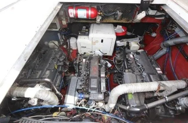 Slide: The Image of Engine room of a 2000 Sunseeker Superhawk 48 Mk II with visible machinery and components. - 16