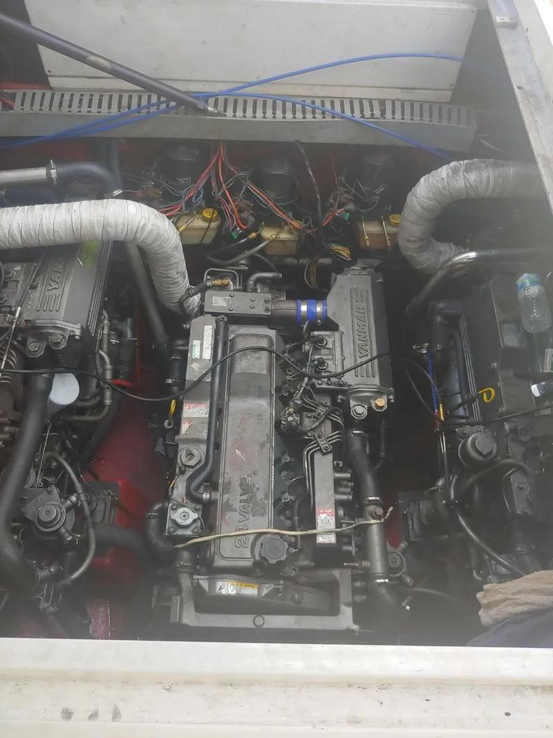 Slide: The Image of Engine compartment of a 2000 Sunseeker Superhawk 48 Mk II with visible wiring and components. - 21