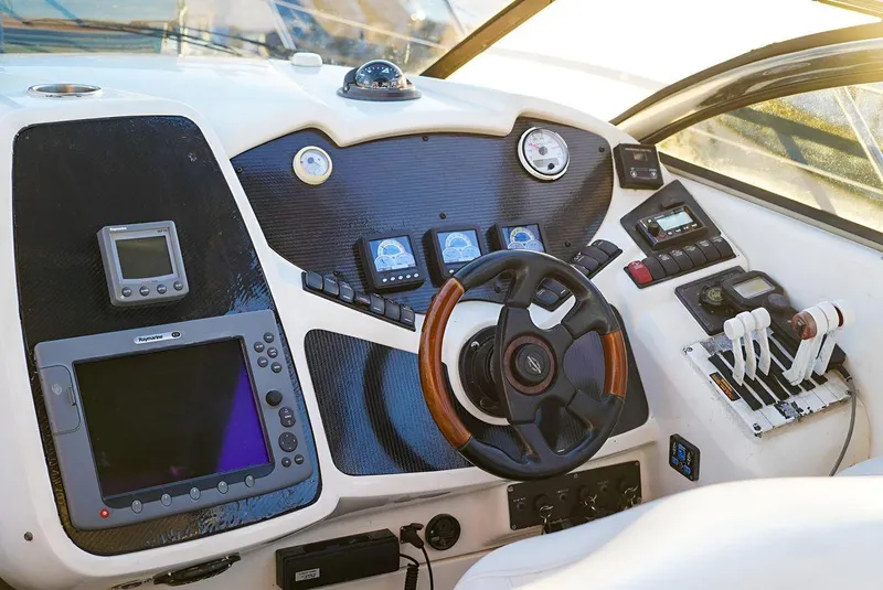 Slide: The Image of Cockpit of 2000 Sunseeker Superhawk 48 Mk II with advanced navigation controls. - 4