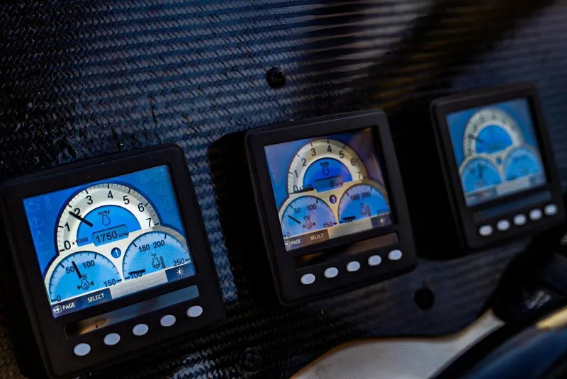 Slide: The Image of Dashboard gauges of a 2000 Sunseeker Superhawk 48 Mk II yacht. - 5