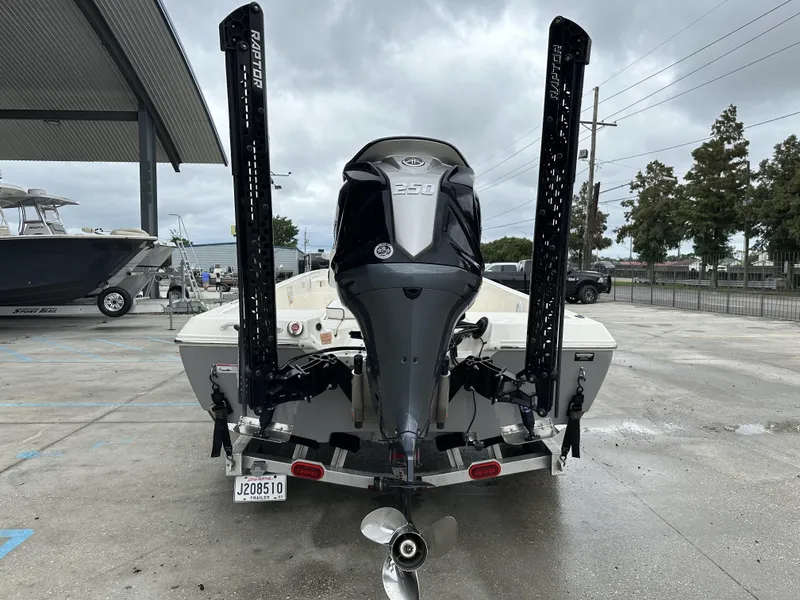 Slide: The Image of 2023 Skeeter SX230 boat with powerful outboard motor and dual Raptor anchors. - 7