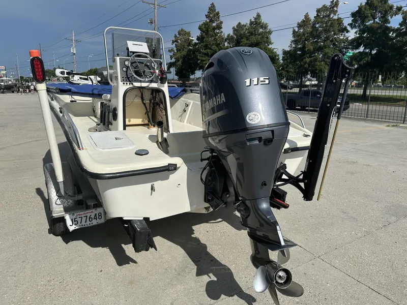 Slide: The Image of 2004 Sea Chaser 175 CC boat with Yamaha 115 outboard motor on trailer. - 2