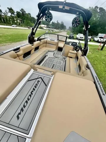 Slide: The Image of 2019 Moomba Makai™ boat interior with tan seating and sleek design. - 10
