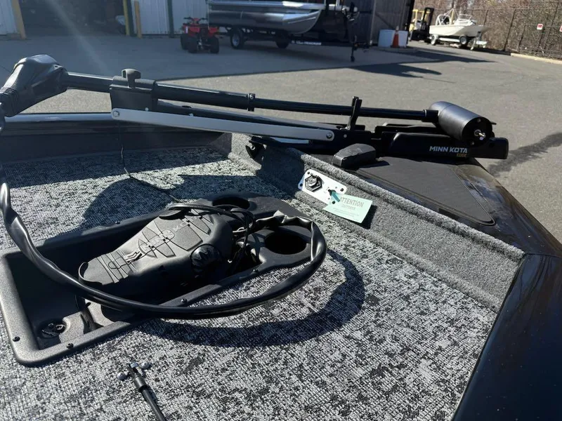 Slide: The Image of 2025 Tracker Pro Team 175 boat with Minn Kota trolling motor on deck. - 8