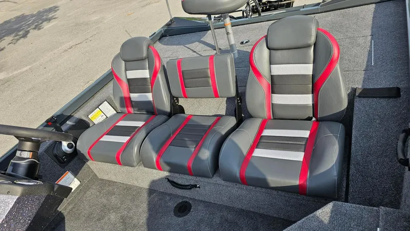 Slide: The Image of 2025 Ranger RT178 boat seats with gray, red, and black design, showcasing modern interior. - 10