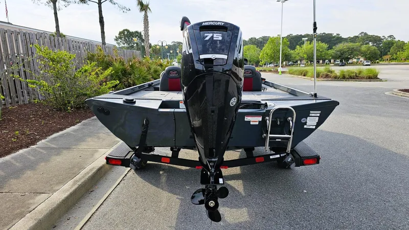 Slide: The Image of 2025 Ranger RT178 boat with Mercury 75 engine, parked in a lot. - 3