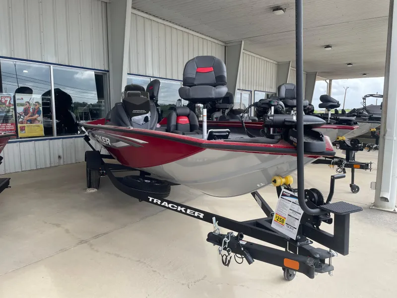 Slide: The Image of 2025 Tracker Pro Team 175 boat on display at dealership. - 6