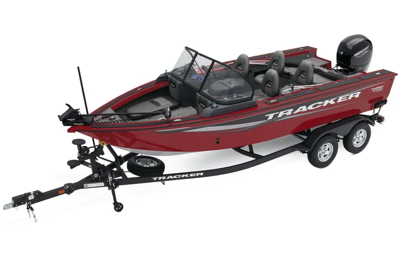 Slide: The Image of 2025 Tracker Targa V-18 Combo boat interior with carpeted deck and storage compartments. - 6