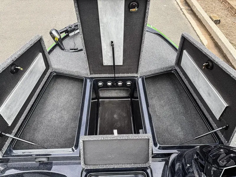 Slide: The Image of 2025 Nitro Z17 boat storage compartments open, showcasing spacious interior design. - 4