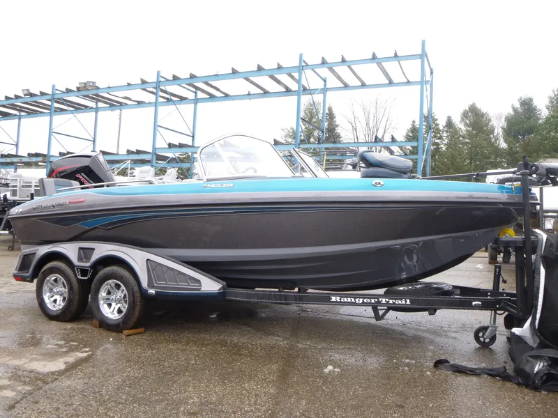 Slide: The Image of 2024 Ranger 1880MS boat on trailer, sleek design, dual-axle, outdoor setting. - 1