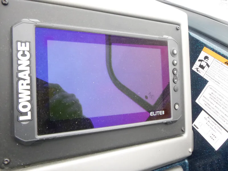 Slide: The Image of Lowrance Elite fishfinder on 2024 Ranger 1880MS boat dashboard. - 10