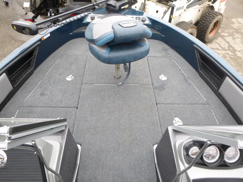 Slide: The Image of 2024 Ranger 1880MS boat interior with seating and control panel. - 12