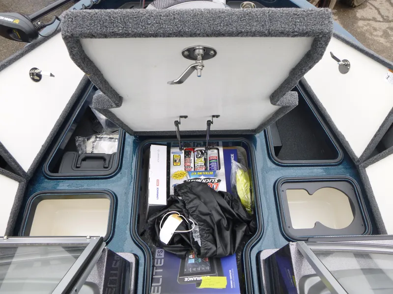 Slide: The Image of 2024 Ranger 1880MS boat storage compartments with fishing gear and equipment. - 14