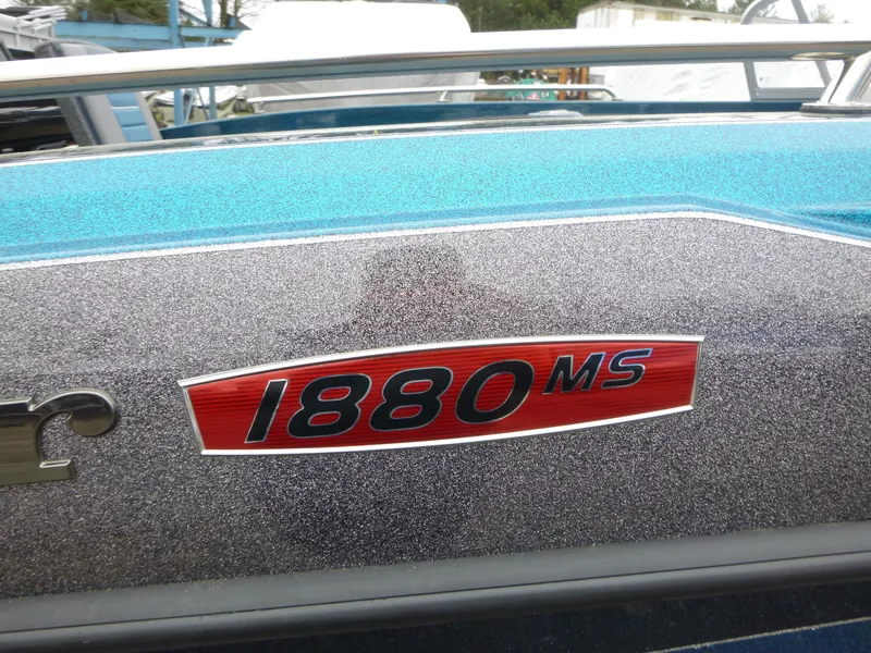 Slide: The Image of 2024 Ranger 1880MS boat with metallic finish and red model emblem. - 2