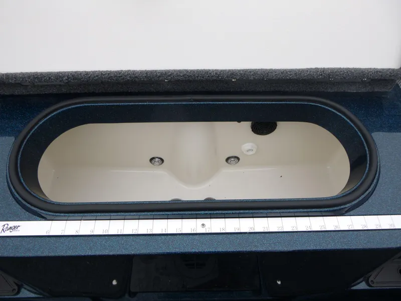 Slide: The Image of 2024 Ranger 1880MS boat livewell with measuring ruler on deck. - 7