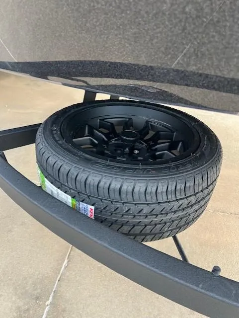 Slide: The Image of 2025 Nitro Z21 XL Pro spare tire mounted on a trailer. - 19