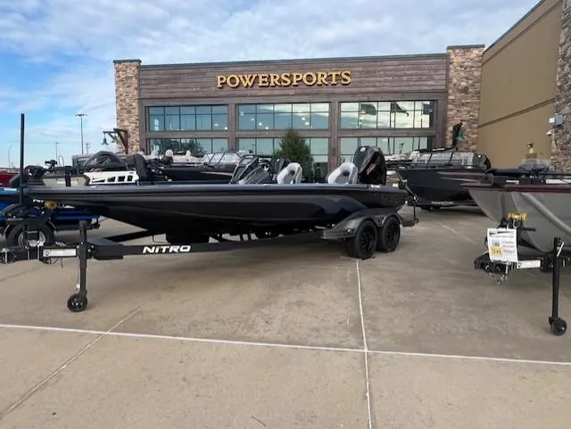 Slide: The Image of 2025 Nitro Z21 XL Pro boat displayed at Powersports dealership. - 3