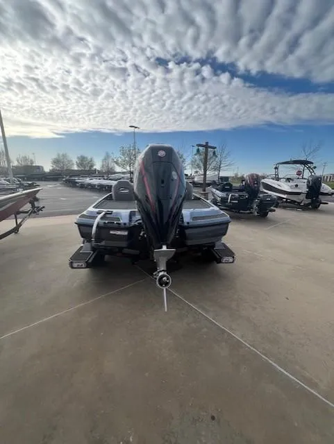 Slide: The Image of 2025 Nitro Z21 XL Pro boat on display under a cloudy sky. - 6