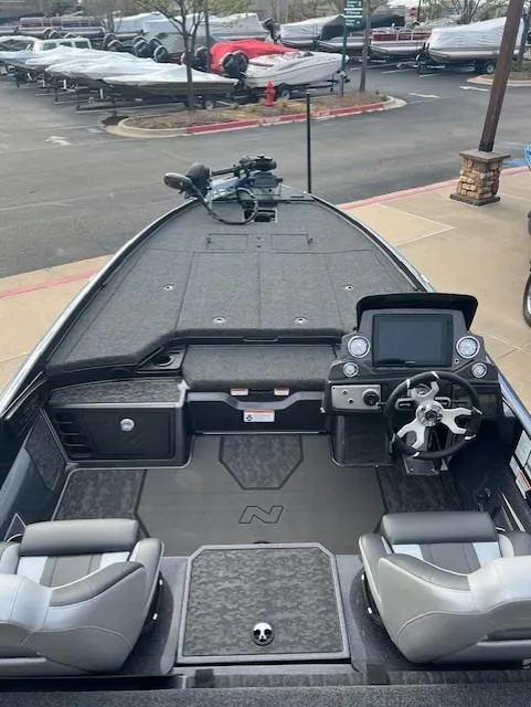 Slide: The Image of 2025 Nitro Z21 XL Pro boat interior with dual seats and advanced dashboard controls. - 8