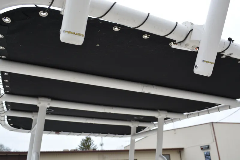Slide: The Image of 2021 Bayliner Element F21 boat canopy with sturdy white frame. - 7
