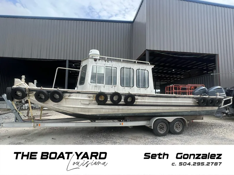 The Image of Custom Flat 28 Cabin Boat 2010 on trailer at The Boat Yard, Louisiana. - 1