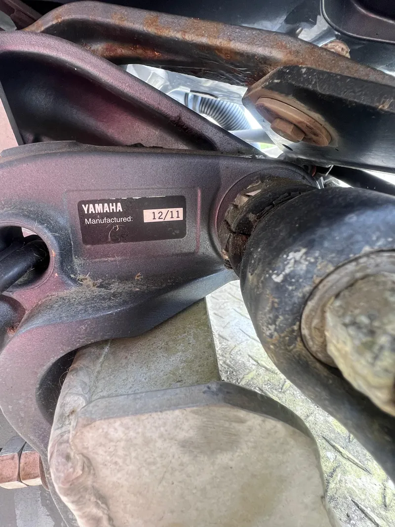 Slide: The Image of Close-up of Yamaha boat engine part, manufactured December 2011, on Custom Flat 28 Cabin Boat. - 6