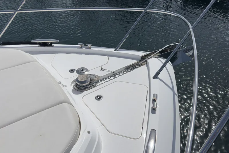 Slide: The Image of Bow of 2022 Princess F55 yacht with anchor chain and railing. - 16