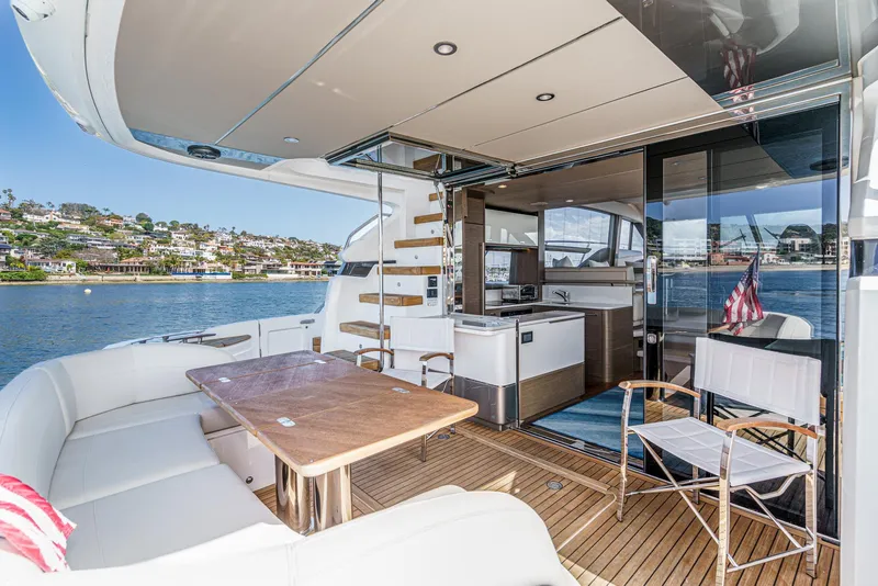 Slide: The Image of Luxurious 2022 Princess F55 yacht with spacious deck and modern interior on serene waters. - 29