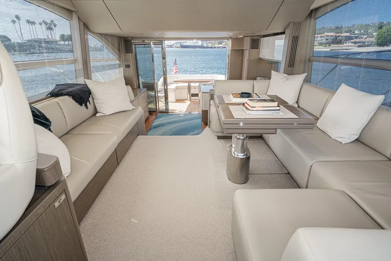 Slide: The Image of Luxurious interior of 2022 Princess F55 yacht with elegant seating and scenic water view. - 46