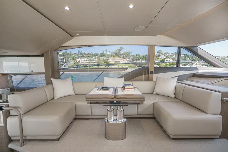 Slide: The Image of Luxurious interior of 2022 Princess F55 yacht with elegant seating and panoramic windows. - 49
