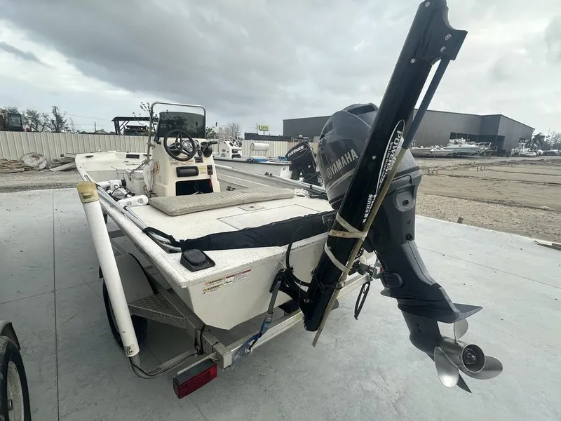 Slide: The Image of 2011 Xpress 18 CC boat with Yamaha outboard motor on trailer. - 6