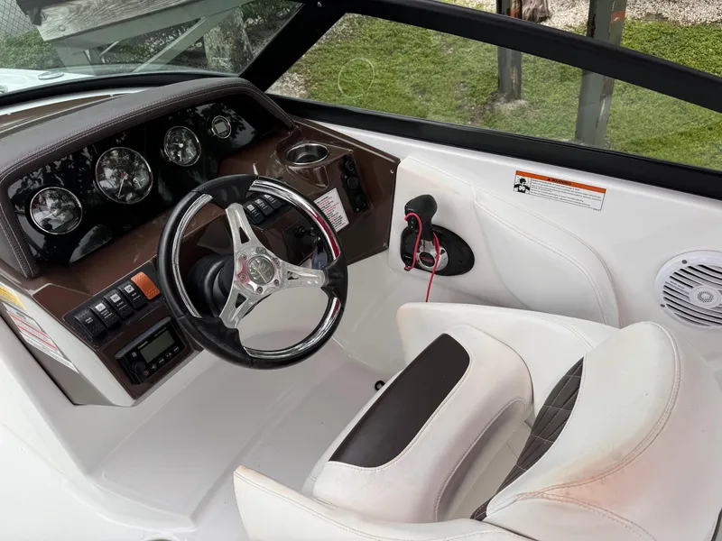 Slide: The Image of Cockpit of 2020 Monterey M-45 boat with steering wheel and dashboard controls. - 10