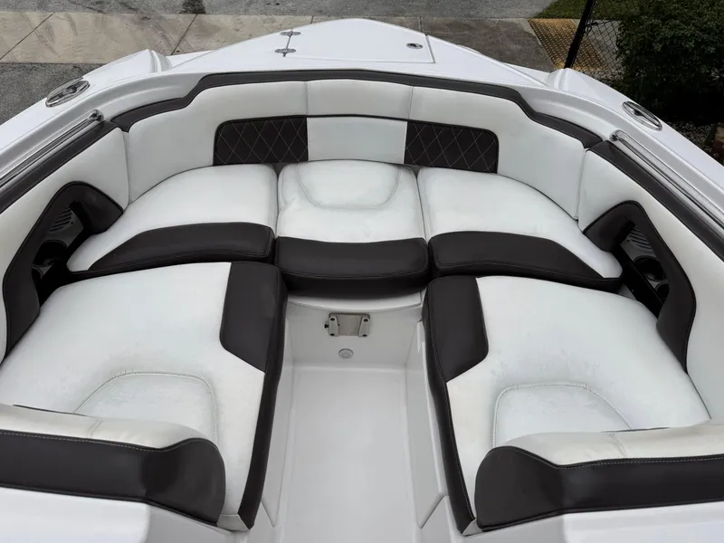 Slide: The Image of Luxurious seating area on a 2020 Monterey M-45 boat, featuring white and black upholstery. - 12