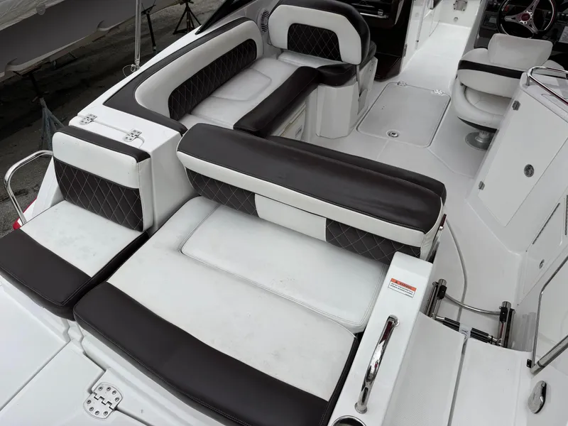 Slide: The Image of Luxurious seating on 2020 Monterey M-45 boat, featuring black and white upholstery. - 21