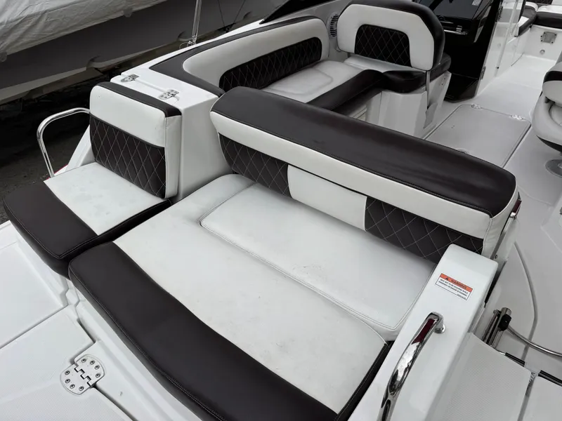 Slide: The Image of Luxurious seating on 2020 Monterey M-45 boat with black and white upholstery. - 24