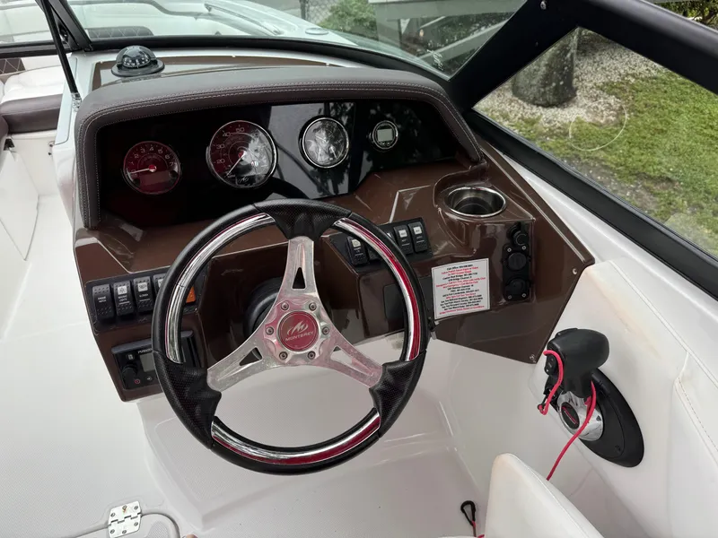 Slide: The Image of 2020 Monterey M-45 boat dashboard with steering wheel and instrument panel. - 5