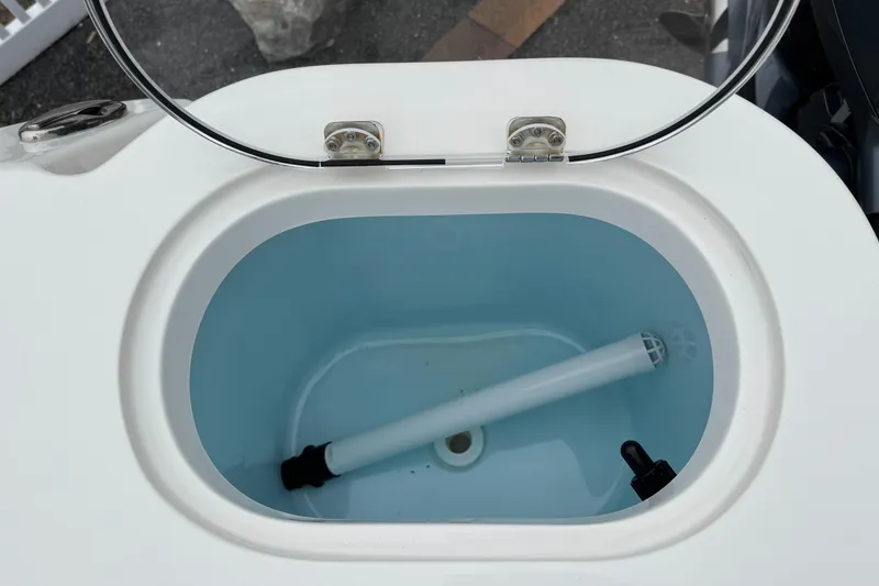 Slide: The Image of Livewell on 2024 Sailfish 220 CC boat, featuring a clean, oval design. - 17